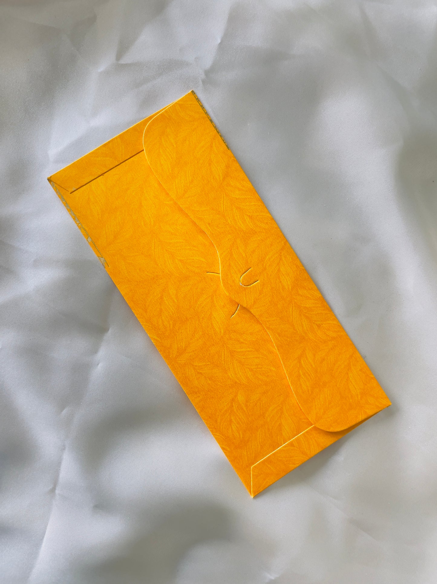 Printed Yellow Pouch - Vibrant yellow pouch with eye-catching print by Creative Jewels