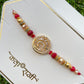 Rakhi with vibrant threads by Creative Jewels