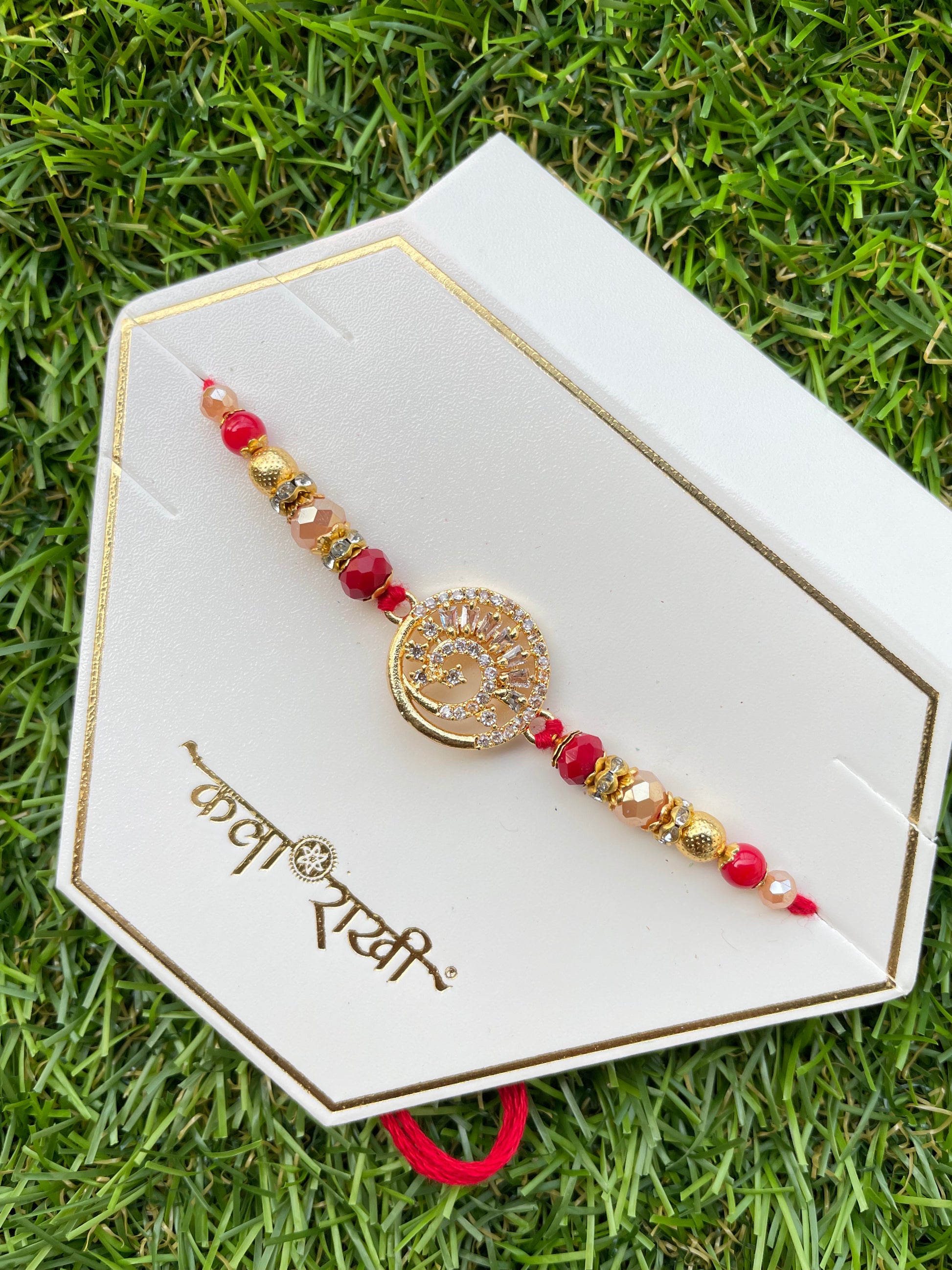 Rakhi with vibrant threads by Creative Jewels